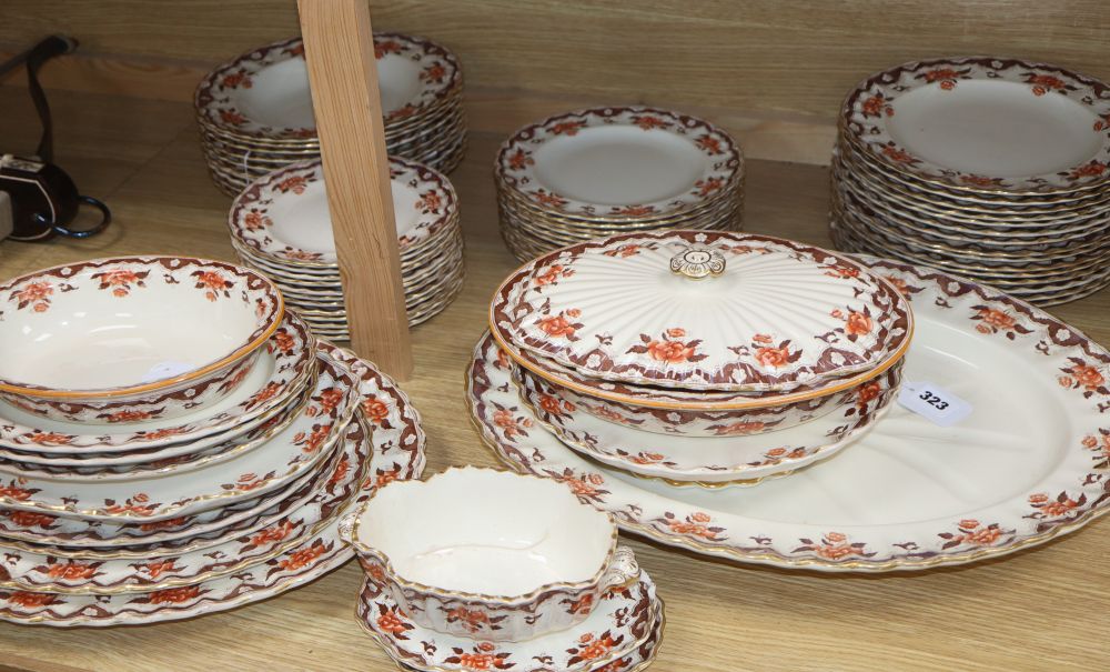 A Victorian Copeland part dinner service, transfer-printed with peonies and foliage in orange and brown,